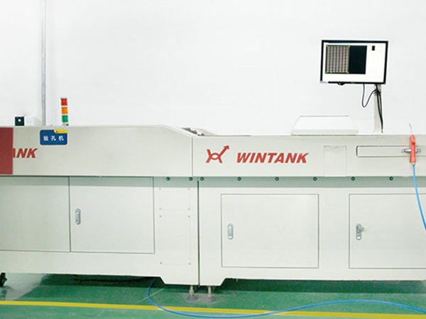 Efficient hole checking machine